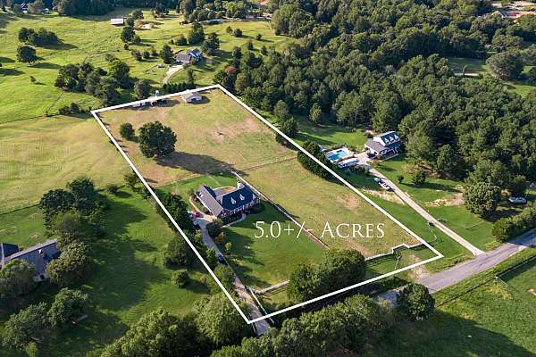 remodeled-farmhouse-5-acres-finished-basement-barns