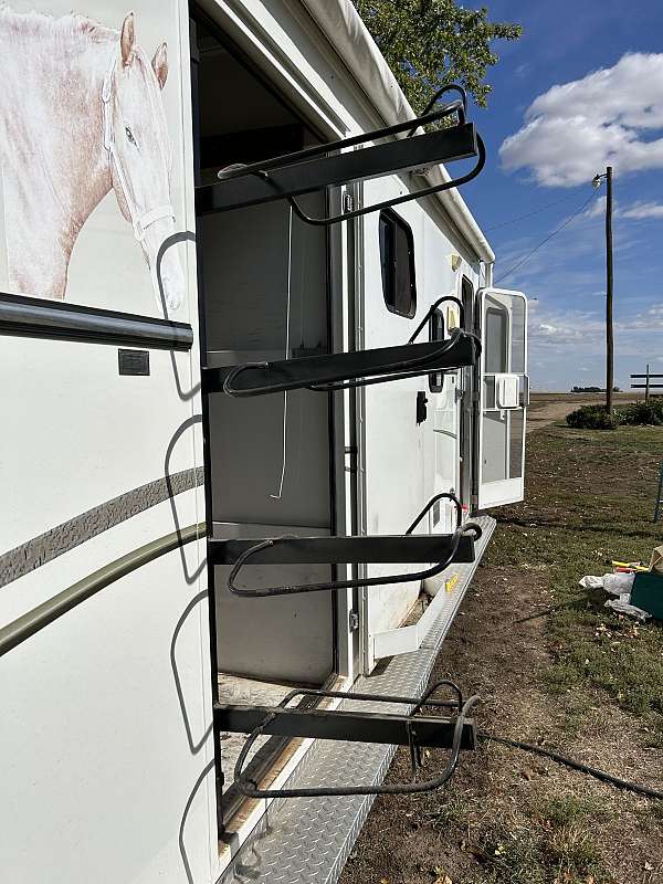 beige-trailer-with-a-fifth-wheel-hitch