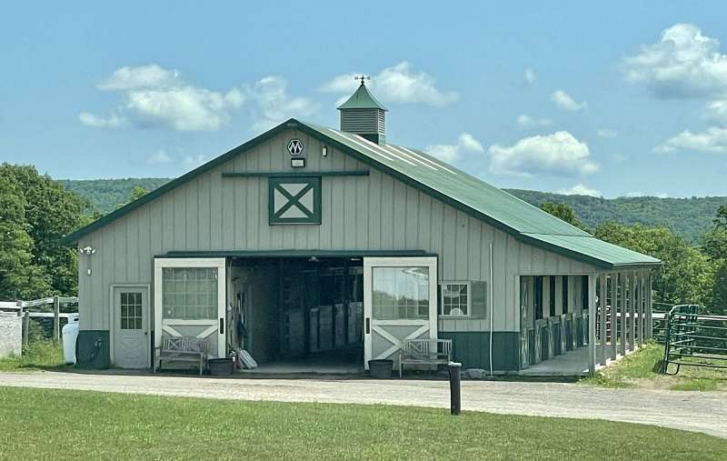 Saratoga an hour plus drive from farm w 2 homes and several barns